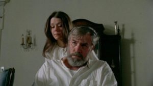 Lisa (Leslie Lee) tends to her helpless grandfather (Douglas Powers) in Frederick R. Friedel's Axe (1974)