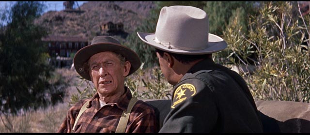 Martin (Cornel Wilde) questions Eli Jones (Tom Fadden) about the murder in Don Siegel's Edge of Eternity (1959)