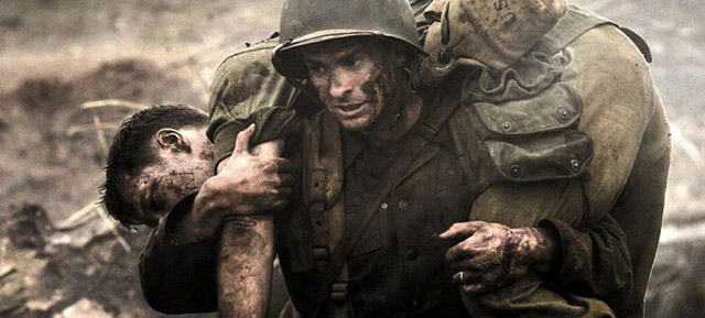 Medic Desmond Doss (Andrew Garfield) rescues one more wounded man in Mel Gibson's Hacksaw Ridge (2016)
