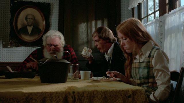 The hospitality of the old man (Charles Elledge) conceals other kinds of madness in Frederick R. Friedel's Kidnapped Coed (1975)