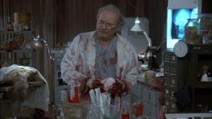 The mad scientist Logan (Richard Liberty) seeks the human in the zombie in George A. Romero's Day of the Dead (1985)