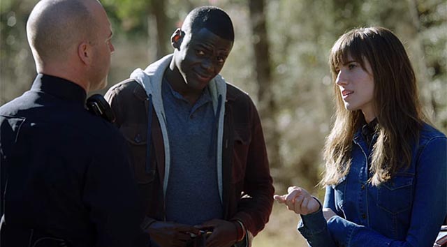 Chris (Daniel Kaluuya) tries not to provoke the traffic cop in Jordan Peele's Get Out (2017)