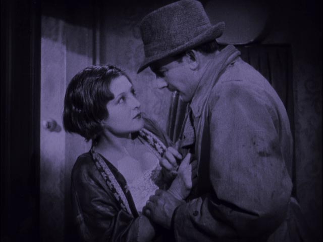 Party boss Gallagher (Warwick Ward) demands that Katie (Lys De Putti) give up Gypo's whereabouts in Arthur Robison's The Informer (1929)