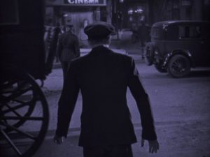 Gypo (Lars Hanson) walks to the police station as if in a trance in Arthur Robison's The Informer (1929)