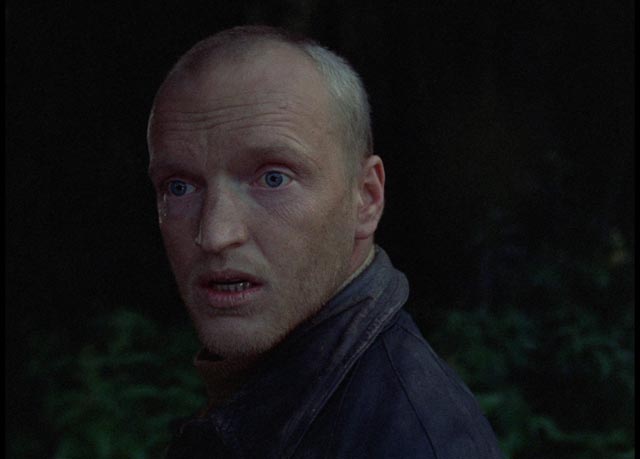 Alexander Kaindanovsky as the Stalker, a holy fool striving to enlighten his cynical companions in Andrei Tarkovsky's Stalker (1979)