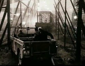 Breaking through the barrier which bars entry to the Zone in Andrei Tarkovsky's Stalker (1979)