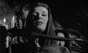 Patricia Jessel as sinister innkeeper and cult member Mrs. Newless in John Llewellyn Moxey's The City of the Dead (1960)