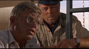 Hardy Kruger as engineer Dorfmann and Richard Attenborough as co-pilot Lew Moran in Robert Aldrich's The Flight of the Phoenix (1965)