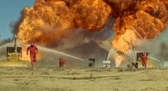 A sepctacular oil field blaze in Andrew V. McLaglen's Hellfighters (1968)