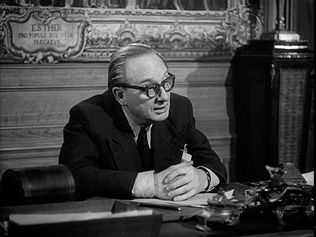 Advocate Aubanel (Jean Debucourt) inadvertently provides Braconnier (Michel Simon) with a plan for murder in Sacha Guitry's La poison (1951)