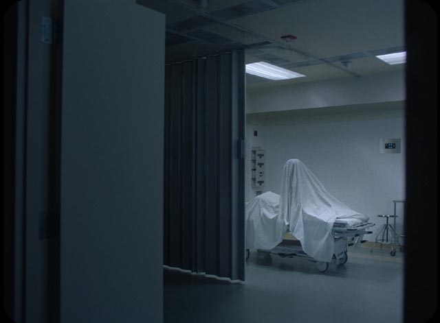 The spirit of C reawakens in the morgue in David Lowery's A Ghost Story (2017)