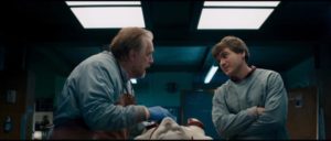 Brian Cox and Emile Hirsch dissect a corpse in Andre Ovredal's The Autopsy of Jane Doe (2016)