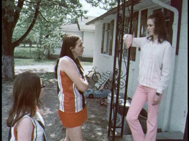 Christina confronts a woman she suspects of having an affair with Mike in Robert Kaylor's Derby (1971)