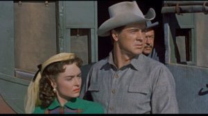 The westward journey of Ben Warren (Rock Hudson) and Jennifer Ballard (Donna Reed) is interrupted in Raoul Walsh's Gun Fury (1953)