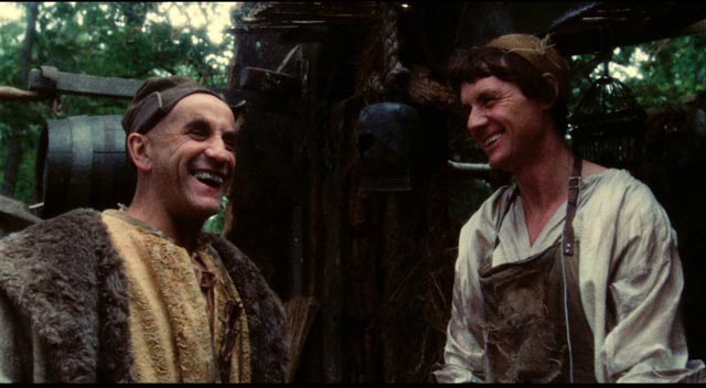 Dennis (Michael Palin) tries to bargain with a customer (Warren Mitchell) in Terry Gilliam's Jabberwocky (1977)