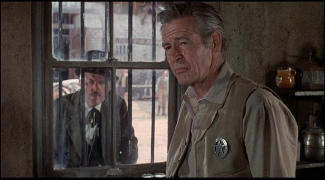 Robert Ryan as a sheriff without moral authority in Michael Winner's Lawman (1971)
