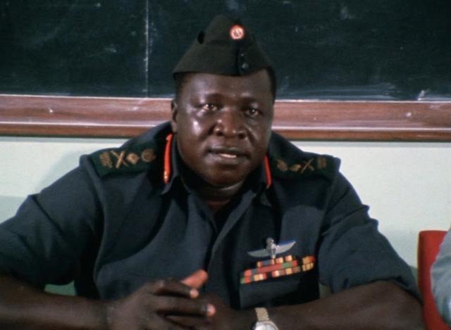 Amin listens for potential criticism at a meeting with doctors in Barbet Schroeder's General Idi Amin Dada: A Self-Portrait (1974)