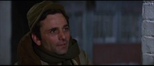 Sergeant Rossi (Peter Falk), a baker who wants only to provide sustenance in the midst of death in Sydney Pollack's Castle Keep (1969)