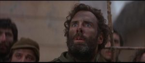 Lt. Billy Bix (Bruce Dern), descends into religious mania as a rejection of war in Sydney Pollack's Castle Keep (1969)