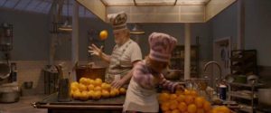 Paddington befrends the menacing prison cook, Knuckles McGinty (Brendan Gleeson) in Paul King's Paddington 2 (2017)