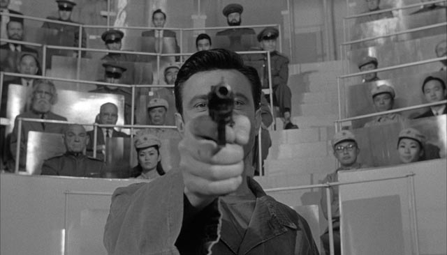 Raymond's conditioning is tested before an appreciative audience in John Frankenheimer's The Manchurian Candidate (1962)