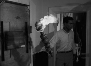 Drastic measures: Ben (Duane Jones) wields a flaming torch inside the farmhouse in George A. Romero's Night of the Living Dead (1968)