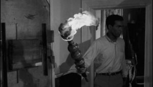 Drastic measures: Ben (Duane Jones) wields a flaming torch inside the farmhouse in George A. Romero's Night of the Living Dead (1968)