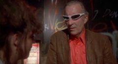 Christopher Lee tries unsuccessfully to hide behind his shades in a supporting role in Philippe Mora's Howling II (1985)