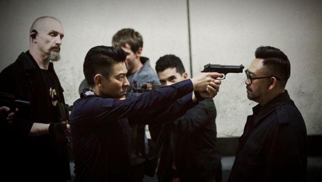 Officer Cheung (Andy Lau) loses patience with psychotic villain Peng Hong (Wu Jiang) in Herman Yau's Shock Wave (2017)