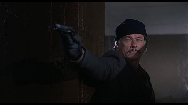 Paul Kersey (Charles Bronson) dressed for his after-hours job in Michael Winner's Death Wish 2 (1982)