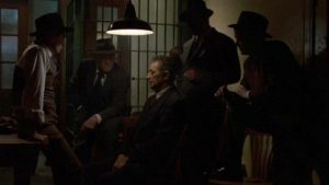 Philip Marlowe (Robert Mitchum) getting the third degree from unfriendly cops in Dick Richards' Farewell, My Lovely (1975)