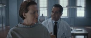 Dr. Galen (Tony Shalhoub) questions psychotic surgeon Rachel Jane (Sigourney Weaver) in Walter Hill's The Assignment (2016)