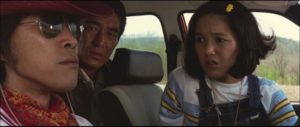 Kin’ya (Tetsuya Takeda), Yûsaku (Ken Takakura) and Akemi (Kaori Momoi) meet by chance on the road in Yoji Yamada's The Yellow Handkerchief (1977)