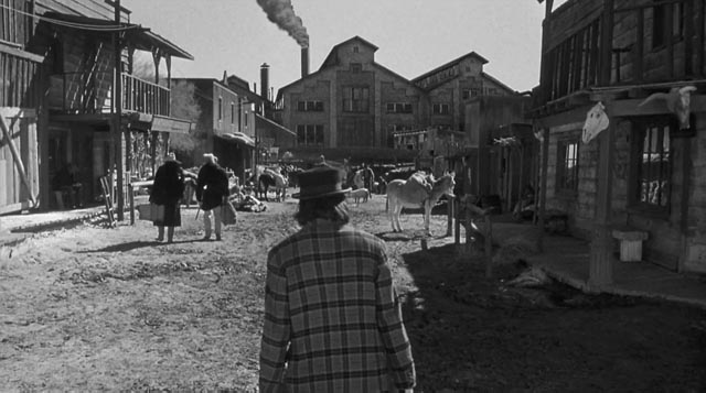 William Blake (Johnny Depp) walks towards the gates of Hell in the town of Machine in Jim Jarmusch's Dead Man (1995)