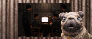 Oracle provides Atari with important information gleaned from television in Wes Anderson's Isle of Dogs (2018)