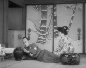 The younger brother contemplates the "worthless" pot which is his inheritance in Sadao Yamanaka's Tange Sazen: The Million Ryô Pot (1935)