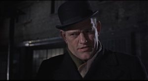 Harry Andrews as Inspector Mendel, aiding in the investigation in Sidney Lumet's The Deadly Affair (1966)