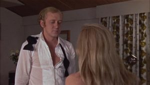 Mick Marler (Nicol Williamson) about to get rough with his wife (Ann Bell) in Jack Gold's The Reckoning (1969)