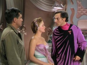 Mr. Zabladowski (Peter Lind Hayes) and Heloise Collins (Mary Healy) confront the musical despot Dr. Terwilliker (Hans Conried) in Dr. Seuss' The 5000 Fingers of Dr. T (1953)