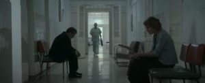 The distance between Romeo (Adrian Titieni) and Magda (Lia Bugnar) is apparent as they wait at the hospital in Cristian Mungiu's Graduation (2016)