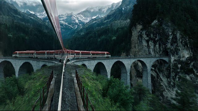 The train carries Lockhart into an unreal landscape in Gore Verbinski's A Cure for Wellness (2916)