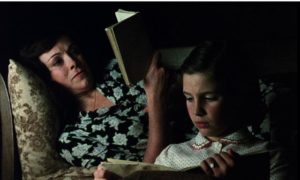 Deprived of her work as a teacher, outside the bond between husband and daughter, Julia (Lola Cardona) retreats into literature in Victor Erice's El Sur (1983)