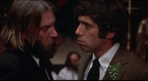 Rev. Dupas (Donald Sutherland) takes a laissez-faire attitude towards religious belief and ritual in Jules Feiffer's & Alan Arkin's Little Murders (1971)