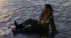 Squadron Leader Peter Carter (David Niven) wakes on a beach which may be Heaven in Michael Powell and Emeric Pressburger's A Matter of Life and Death (1946)