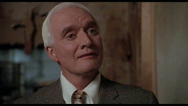 John P. Ryan as the Mephistophelean Mr. Bones urging Henry on to murder in Alexander Cassini's Star Time (1991)
