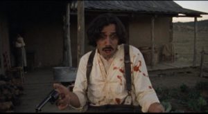 Gregorio Cortez (Edward James Olmos) looks in horror at the violence he's been unexpectedly caught up in in Robert M. Young's The Ballad of Gregorio Cortez (1982)