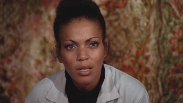 Ivory Stone as Dr. Winifred Walker, the vet's concerned fiancee in William A Levey's Blackenstein (1973)