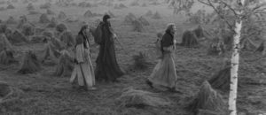Andrei (Anatoliy Solonitsyn) and his companions wander through a chaotic world in Andrei Tarkovsky's Andrei Rublev (1966)