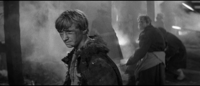 Boriska (Nikolay Burlyaev) oversees the firing of the bell in Andrei Tarkovsky's Andrei Rublev (1966) ...