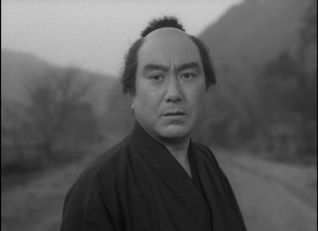 Genpachi (Chiezô Kataoka), a servant who tries to protect his weak master in Tomu Uchida's Bloody Spear at Mount Fuji (1955)